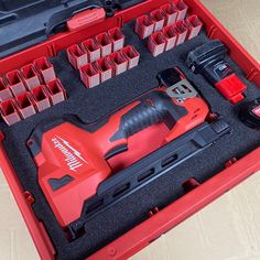 a red tool box filled with lots of tools