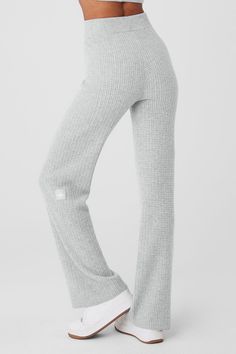 These pants go beyond lounge—they’re next-level luxurious. Done in a waffle knit texture and crafted from the softest, snuggliest cashmere you’ve ever felt, these are the kind of pants you’ll never want to take off. The laid-back fit pairs drapey wide-legs with a high-rise ribbed waistband, for a cozy-chic silhouette that looks even better with the Cashmere Plush Waffle Cropped Long Sleeve. Ribbed Lounge Pants, Alo Yoga Activewear With Ribbed Waistband For Loungewear, Alo Yoga Relaxed Fit Lounge Pants, Casual Alo Yoga Bottoms With Ribbed Waistband, Casual Alo Yoga Sweatpants With Ribbed Waistband, Cozy Full-length Pants With Ribbed Waistband, Grey Knitwear, Cashmere Pants, Chanel Fashion Show