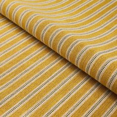 a yellow and white striped fabric