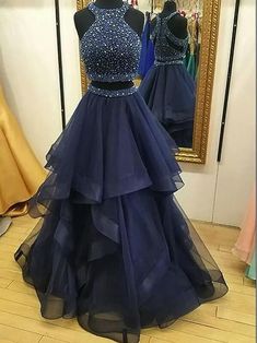 This Dress is fashionable for every occasion. the dress is made-to-order by professional tailors. You can choose from 50 colors, Regular sizes 2 to 16 and plus sizes 14w to 26W. Custom size is also available.. The product details: Color: Navy Blue, Silhouette: A-Line, Neckline: Halter, Waistline: Natural Waist, Length: Long, Primary Fabric: Organza Layered Prom Dress, Blue Prom Gown, Navy Blue Formal Dress, Navy Blue Prom Dress, Two Piece Prom, Navy Prom Dresses, Elegant Prom, Blue Dress Formal, Prom Dresses Two Piece