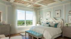 a bedroom with blue walls and white furniture