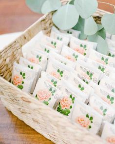 a basket full of soaps sitting on top of a table