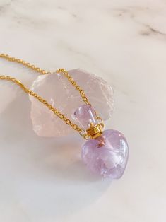 Amethyst | protection, manifestation, and focus This crystal necklace was responsibly and lovingly hand sourced. The chain measures approximately 18” and the potion bottle measures approximately 39 mm long, gold-plated brass. Potion Bottles Aesthetic, Blood Vial Necklace, Protection Manifestation, Love Potion Bottle, Amethyst Protection, Potion Bottle Necklace, Potion Necklace, Love Potions, Beaded Jewlery