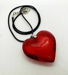 "Blood Red Glass Heart Necklace. A gorgeous puff heart shaped pendant in beautiful blood red. A real eyecatcher! It is a statement necklace and measures approximately 4.5cms wide at it's widest point. A real beauty! Comes to you on a necklace which is 16\" leather cord with a 2\" extender chain. It is presented in gift packaging." Big Heart Necklace, Red Heart Necklace, Red Accessories, Blood Red, Heart Shape Pendant