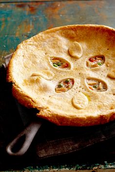 a pie sitting on top of a wooden table