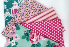 several different types of fabric with flowers and polka dots on them, all in various colors