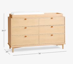 an image of a baby crib with the measurements for it's bed and dresser