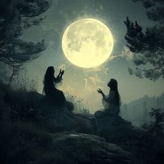 two women sitting on rocks in front of a full moon with trees and grass around them