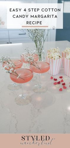 pink cocktails, pink margarita, coup glasses, galentine's day party, galentine's drinks, all white marble kitchen, 21Seeds Tequila. Cocktail Recipes Cotton Candy, Cotton Candy Margarita Recipe, Cotton Candy Cocktail Recipe, Pink Margarita Recipe, Cotton Candy Margarita, Girls Night Drinks Cocktails, Galentines Ideas, Girls Night Cocktails, Cotton Candy Drinks