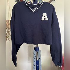 H&M (Divided), Navy Cropped Sweatshirt Size Xxl Never Worn Ships Quickly! Offers Welcome! Fall College Style Loungewear Top, Navy Cotton Varsity Top, H&m Cotton Sporty Sweatshirt, H&m Sporty Cotton Sweatshirt, Blue Cotton College Style Tops, Blue Cotton Tops For College, Navy Long Sleeve Top For College, H&m Letter Print Sweatshirt For Fall, H&m Cotton Sweatshirt With Letter Print