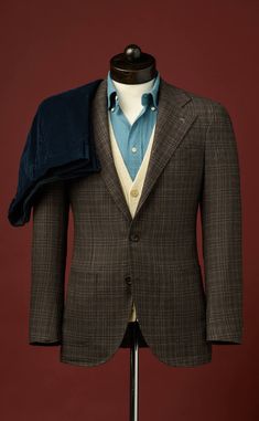 This handsome sport coat uses an elegant blend of silk and wool from Di Pray in a classic brown check, with accents of tan and teal. Styled in our signature Neo Cut, details include unpadded shoulders, wide notch lapels, and a 3-roll-2 button closure. An incredibly versatile year-round jacket, you can dress it up with a shirt and trousers, or dress it down with a turtleneck sweater and jeans. Sweater And Jeans, Classic Brown, Sweaters And Jeans, Turtle Neck, Trousers