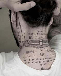 a man with a neck tattoo that has writing on it