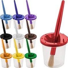 six plastic cups with different colored brushes in them