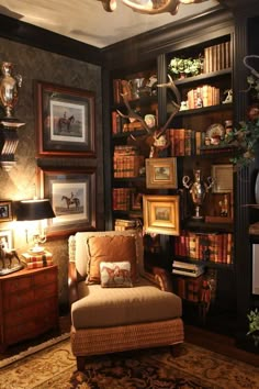 a living room filled with furniture and bookshelves covered in lots of shelves next to a lamp