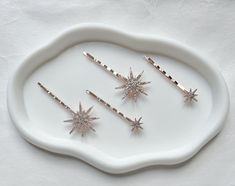 Add a touch of elegance to your hairdo with these stunning hair clips. The sparkling rose gold star crystal pattern makes it a perfect accessory for any occasion, especially weddings.  Made from high quality metal and features a sparkling gold finish, making them a great addition to any bridal or bridesmaid outfit. Ship with Royal Mail service. Express delivery available at checkout. Thank you for visiting my shop Allbeautifulbybren Stars Hair Clip, Star Hair Pins, Celestial Hair, Hair Clips Wedding, Wedding Rose Gold, Sparkling Rose, Star Crystal, Wedding Rose, Crystal Pattern