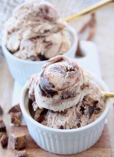 two bowls filled with ice cream and chocolate chunks