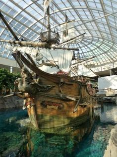 an old pirate ship is in the middle of a museum exhibit at seaworld san diego