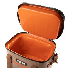 an orange and gray suitcase is open on a white background with the lid opened to show it's inner compartment