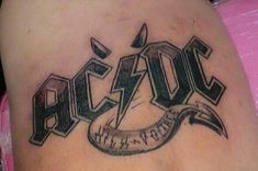 a woman's stomach with the word acro written in cursive font