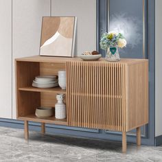 a wooden cabinet with plates and vases on it