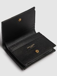 Height: 8.5cm Width: 11cm Depth: 2cm. Front gold-colored metal logo. Front flap with snap button closure. One internal bill compartment. Five internal card slots. One internal coin pocket Ysl Card Holder, Versace Brand, Ski Accessories, Loafer Mules, Sports Accessories, Metal Logo, Flat Espadrilles, Swim Accessories, Credit Card Holder