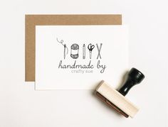 a rubber stamp that says happy handmade by crafty sue next to a piece of paper