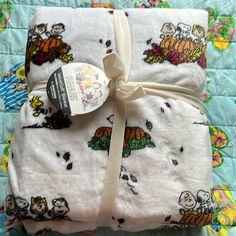 the blanket is wrapped up and ready to be put into the baby's bed