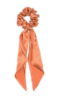 The L. Erickson USA Kings Road Pony - Silk Charmeuse is a chic, handmade bow scrunchie featuring a long scarf-like sash. Easy hair style and comfortable, all day ponytail holder for women. Add a pop of vibrance to any outfit for any occasion - the office, beach, target run, you name it! Have fun with your hair wardrobe with this stylish hair tie!This satin scarf scrunchie is featured in trending colors and prints, including vibrant solids, retro psychedelic swirls, and more!Product Features:- Ha 70s Silk Scarf, Silk Hair Ties, Orange Silk Scarf, Luxury Multicolor Silk Satin Scarf, Target Run, Bow Scrunchie, Luxury Orange Silk Scarf, Trending Colors, Satin Scarf