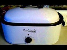 a white crock pot sitting on top of a counter