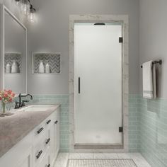 a bathroom with two sinks and a shower