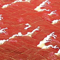 red and white fabric with waves on it