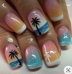 a mani with palm trees and sunsets on the nails is shown in this image