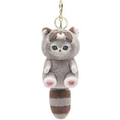 a stuffed animal keychain with a cat on it's back hanging from a chain