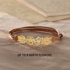 ♥ Birth Flower Leather Bracelet ♥  This leather bracelet is a delicate and feminine design for the woman you love. The combination of cut and shaped birth flowers on the bracelet creates an elegant and modern necklace for anyone who wears it. P R O D U C T ∙ I N F O * Material: Solid 925 Sterling Silver  * Finishing: Silver - Yellow Gold - Rose Gold  * Up to 7 birth flowers * All of our jewelry is handmade from scratch and packaged with care in our workshop. H O W * T O * O R D E R 1. Select you Anniversary Bracelets With Flower Charm, Adjustable Flower Bracelets For Birthday Gift, Adjustable Rose Gold Bracelet With Flower Charm, Flower Shaped Anniversary Bracelets, Elegant Adjustable Leather Bracelet For Anniversary, Adjustable Gold Leather Bracelet Gift, Brown Adjustable Flower Bracelet, Flower Shaped Bracelets For Mother's Day, Flower-shaped Bracelets For Mother's Day