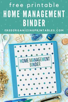 a binder with the words home management binder surrounded by office supplies and pens