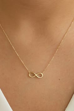 "14k Gold Infinity Necklace, Real Gold Infinite Love Choker Necklace, Valentines day gift, Everyday Necklace, Solid Gold Dainty Infinity Necklace is Graduation Gift Inifinity necklace, which we specially designed for you, is very suitable for daily use. Infinity, a very beautiful and special motif to show your love, is designed for you according to the latest trends. More details; Our product weighs 1.70 gr and the chain length is 42 cm. There may be +/- 0.15 change in gram information due to pr Gold Infinity Necklace, Infinity Necklace Gold, Jewelry Necklace Simple, Evil Eye Necklace Gold, Pretty Jewelry Necklaces, Gold Chain Design, Gold Necklace Simple, Infinite Love, Infinity Necklace