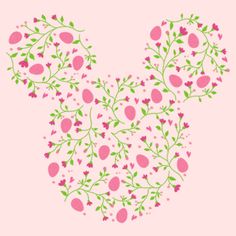 a mickey mouse head with pink flowers and green leaves in the shape of a heart