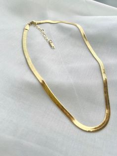 Dainty 18k Gold Herringbone Chain, Snake Layered Choker, Gold Plated Flat Snake Necklace, Valentine's Day, Birthday, Christmas Gift For Her. This trendy Snake Chain Choker is made of 18k gold plated with 316L stainless steel. This chic gold necklace consists of small rings that are connected tightly together to form a smooth, sleek snake chain. This smooth, silky, and shiny piece of jewelry is something to have your heart on. When it comes to classic, effortless jewelry, the herringbone necklace Herringbone Gold Necklace, Snake Necklace Gold, Snake Choker Necklace, Serpent Necklace, Gold Herringbone Chain, Gold Snake Chain, Statement Outfit, Choker Gold, Herringbone Chain