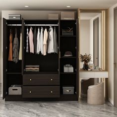 an open closet with clothes hanging on the doors and drawers, in front of a mirror