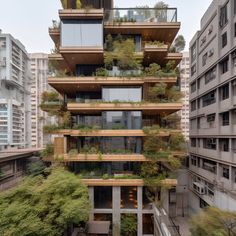 an apartment building with many balconies and plants growing on the top floor, surrounded by tall buildings