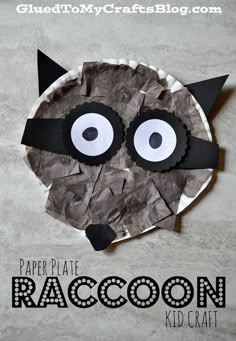 the paper plate raccoon craft is made to look like it has googly eyes