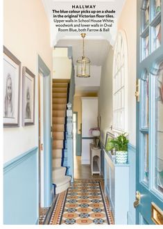 the hallway is painted in blue and white