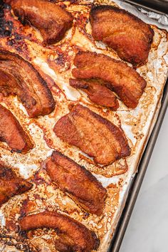 cooked bacon on a baking sheet ready to go into the oven for dinner or dessert