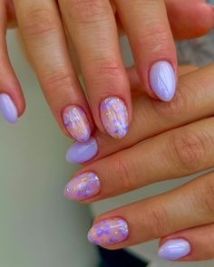 50+ Pretty Spring Nail Designs You Need To Try; purple spring nails!  This includes spring nail designs 2024, spring nail designs acrylic, spring nail designs gel, spring nail designs almond shape, lilac nails, lavender nails, spring nail designs short and more! This also includes spring nail designs simple, spring nail designs almond, spring nails purple, spring nail design ideas, spring nails, spring nail art, spring nails ideas, spring nails trends & more! #springnails #springnaildesigns #springnailsideas Gel Nail Art Designs Purple, Easter Nail Short, Short Acrylic Nails Almond Spring, Lavender Nails With Butterflies Almond, Oval Nail Ideas Spring, Fun Nail Designs Purple, Light Blue Nails With Design Spring, Short Almond Nails Lavender, Spring Nails Purple Lavender