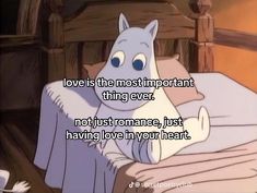 a cartoon character laying in bed with the caption love is the most important thing ever not just romance, just having love in your heart