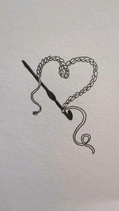 an ink drawing of a heart with a hook in the middle