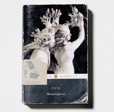 a book with an image of two women holding flowers in their hands and the cover is black and white