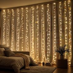 The combination of lights, decorations, and the wooden furniture creates an inviting atmosphere filled with warmth and holiday cheer. Fairy Lights Vertical, Low Light Decor, Twinkle Light Wall, Fairy Lights On Ceiling, Hanging Lights For Bedroom, Frame Lights, Cozy Bedroom Lighting