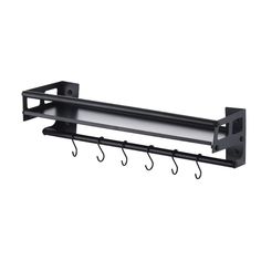 a black rack with hooks on it