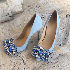 Step into elegance with our Light Blue Vegan Suede Stiletto Heels. Adorned with dazzling rhinestones, these pumps add a touch of glamour to any outfit. Ethically crafted from vegan suede, these heels are both stylish and cruelty-free. Color: Light blue Material: Vegan suede Heel height: 4.72" / 120 mm approx Product measurements were taken using size 8. Please note that measurements may vary by size. Toe: Pointed toe Faux crystal and rhinestone embellishment Handcrafted US sizing. Fits true to size. Heels Rhinestone, Rhinestone Pumps, Pumps Heels Stilettos, Blue Heels, Prom Shoes